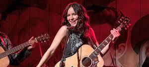 Bailey auf der Bühne.